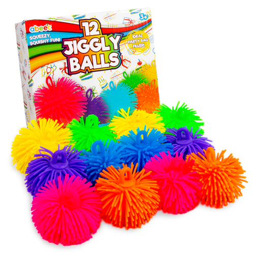 A box of abeec Jiggly Balls alongside a pile of brightly colored, fuzzy squeeze balls in neon pink, orange, yellow, green, blue, and purple on a white background.