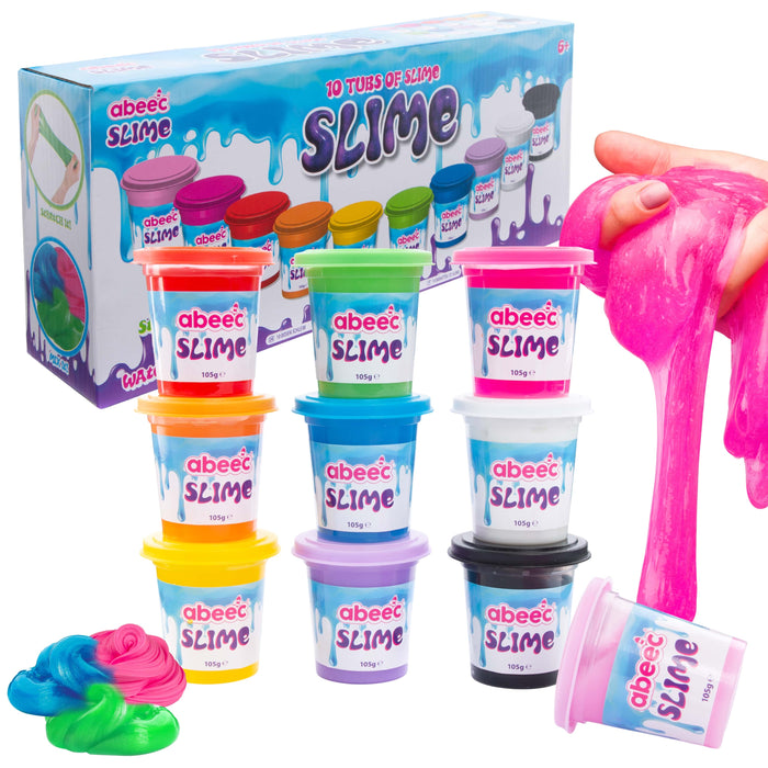 A set of 10 tubes of abeec Slime in various colors, displayed in front of their blue and white retail box. A hand is shown stretching a large ball of bright pink slime on the right, and additional slime is piled in the bottom left corner.