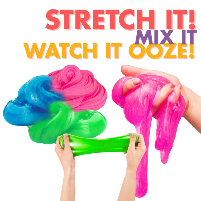 Three hands stretching colorful slime against a white background with bold text reading 'STRETCH IT! WATCH IT OOZE!' and 'MIX IT'. The slime colors include bright pink, blue, green, and a stretched green section.
