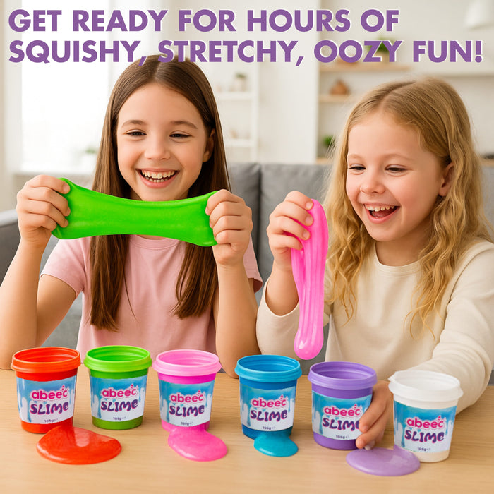 Two young girls smiling and stretching colorful slime, with multiple abeeb Slime toy containers arranged on a table in front of them. Large promotional text at the top reads, 'GET READY FOR HOURS OF SQUISHY, STRETCHY, OOZY FUN!'.