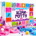 A colorful 'Super Slime + Putty set' box shown on a white background with decorative slime and putty scattered around it. The box features bright labeled panels for different slime and putty types, and measurement arrows indicate the box height of 22cm and width of 32cm.