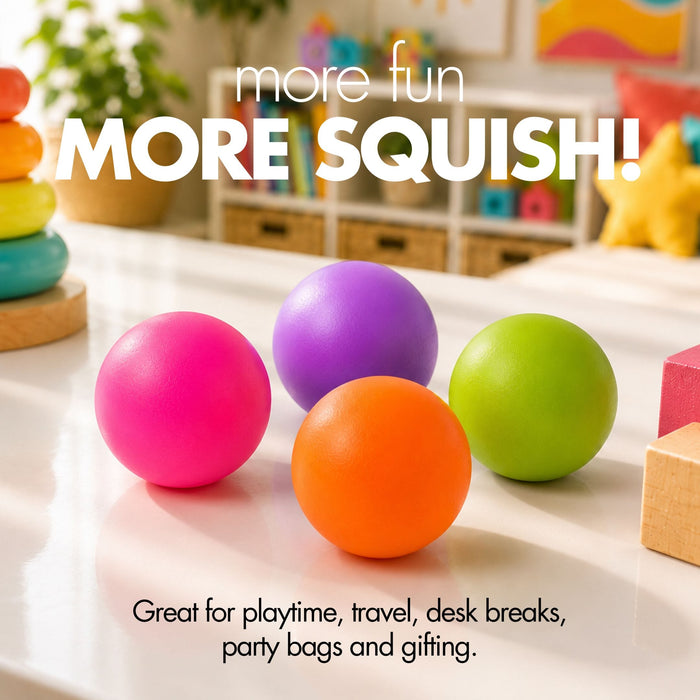 Four colourful squishy balls in pink, purple, orange, and green arranged on a white tabletop in a bright playroom setting, with large text reading 'more fun MORE SQUISH!' and smaller text below.