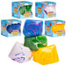 Four colourful squishy marble cubes displayed in front of their blue retail boxes on a white background. The cubes feature marbled swirl patterns in blue, green, yellow, pink, and purple, with some showing smooth solid colors.