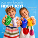 Two children smiling and holding four colorful marble fidget toys against a bright blue background, with promotional text highlighting the toys' features.