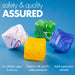 Four marbled cube-shaped bath or body products in white, green, yellow, and blue are arranged on a light blue background.
