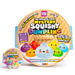 The Original Viral Mystery Squishy Dumpling Rainbow Glitter Edition toy set by Crazy Fun, featuring a large round cardboard package and a smaller matching mini squishy dumpling on a white background to show the size comparison. 