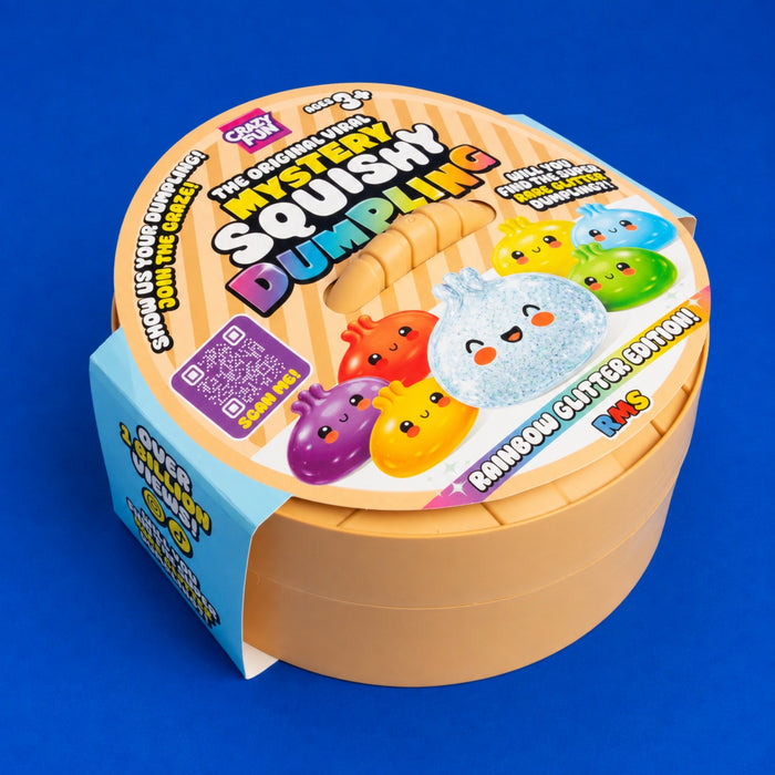 A round plastic toy container for 'The Original Viral Squishy Dumpling' by RMS, featuring a light peach-beige body with a colorful printed lid. The packaging includes a light blue side flap and shows cartoon dumpling characters on the top.