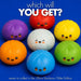 Seven colorful, kawaii-style squishy buns arranged on a bright blue background with the text 'which will YOU GET?' at the top and 'seven to collect in the 28cm Rainbow Glitter Edition' at the bottom.