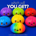 Seven cute, kawaii-style squishy buns in various colors, including purple, green, red, blue, yellow, and rainbow, arranged on a solid blue background with the text 'which will YOU GET?' and 'seven to collect in the Rainbow Edition' at the bottom. Rainbow is the rare edition.