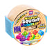 Crazy Fun Mystery Squishy Dumpling Rainbow Edition toy in its retail packaging, featuring a beige squishy dumpling inside a circular cardboard container with colorful cartoon graphics.