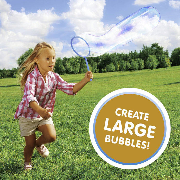 girl playing with giant bubble kit