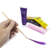 brush painting with purple ready mixed paint
