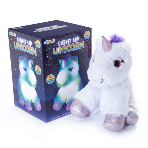 light up plush unicorn box and content